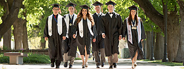 Graduating students are walking on the Logan campus