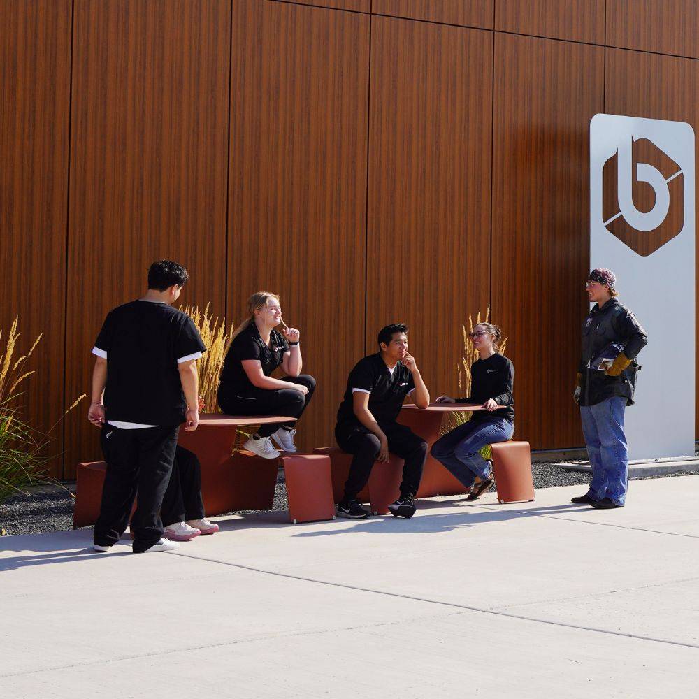 Students sitting outside at BTech in Logan, Utah.