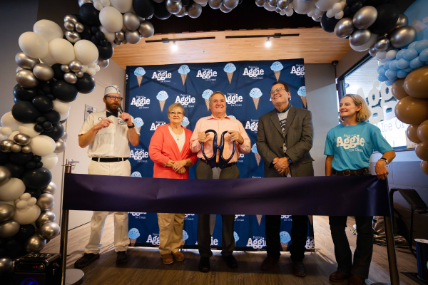 ribbon cutting at aggie ice cream at blue square