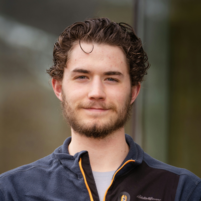 man standing outside a building