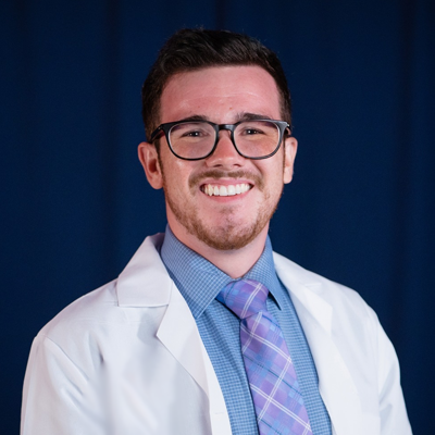 photo of man in white medical coat