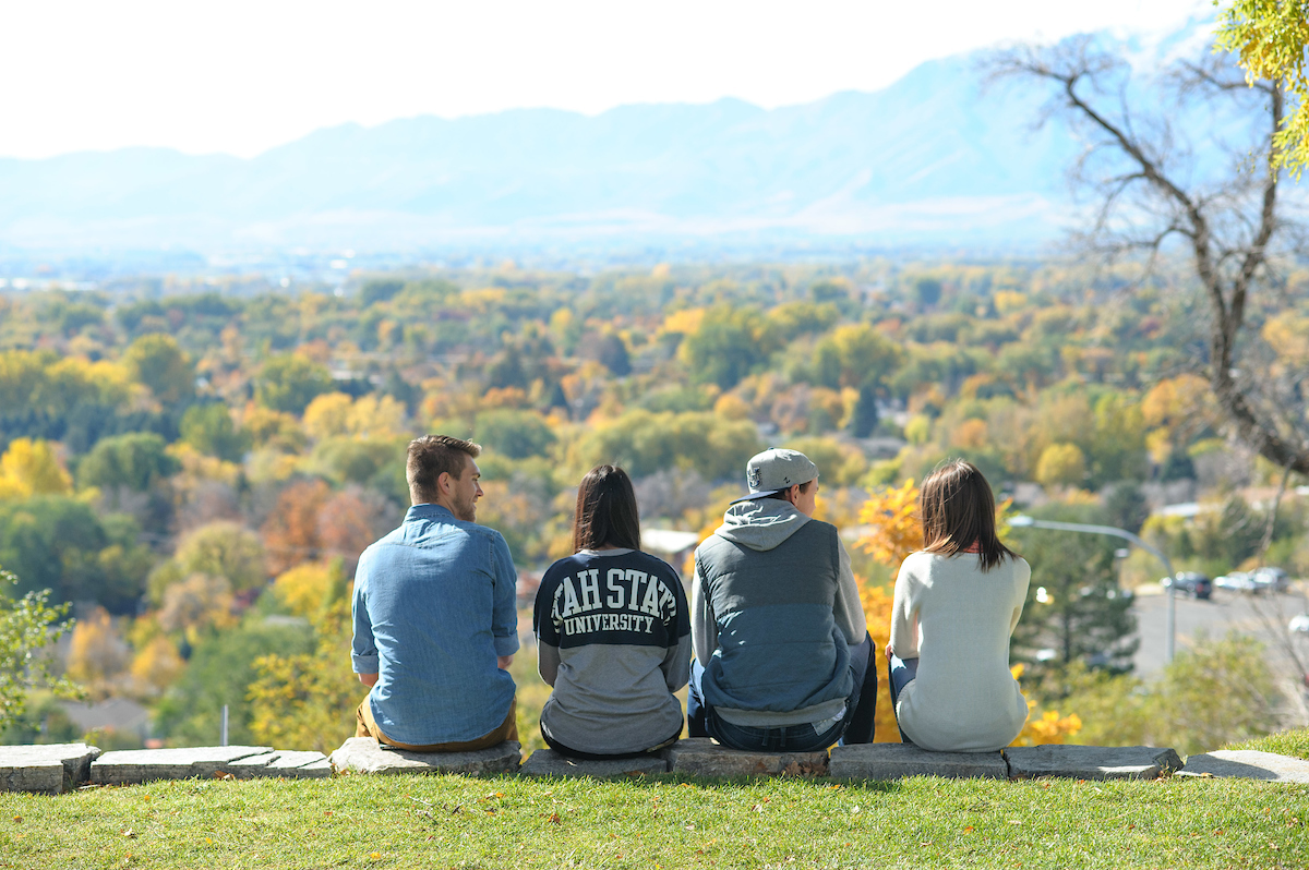 USU students looking over the Cache Valley near the Logan Campus.