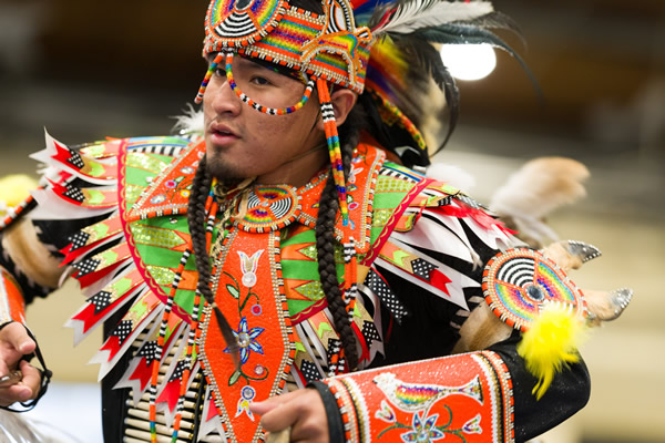 Powwow Male Dancer competing in Traditional Native American clothing