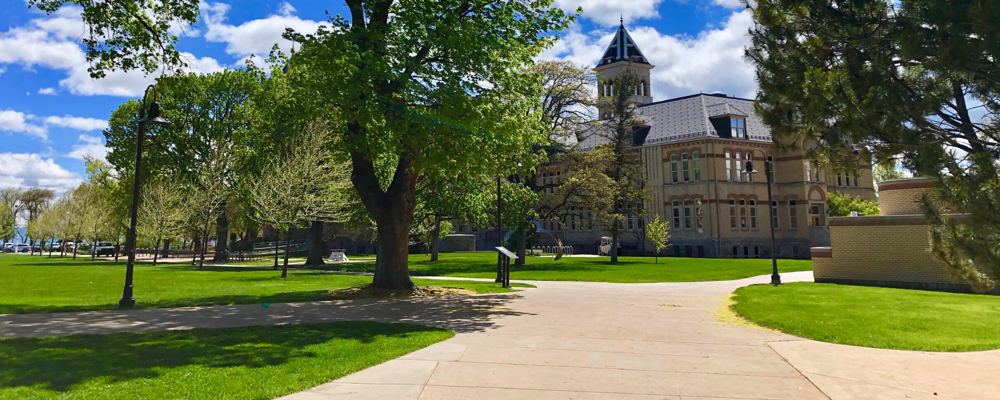 USU's Old Main is seen on a sunny summer day.