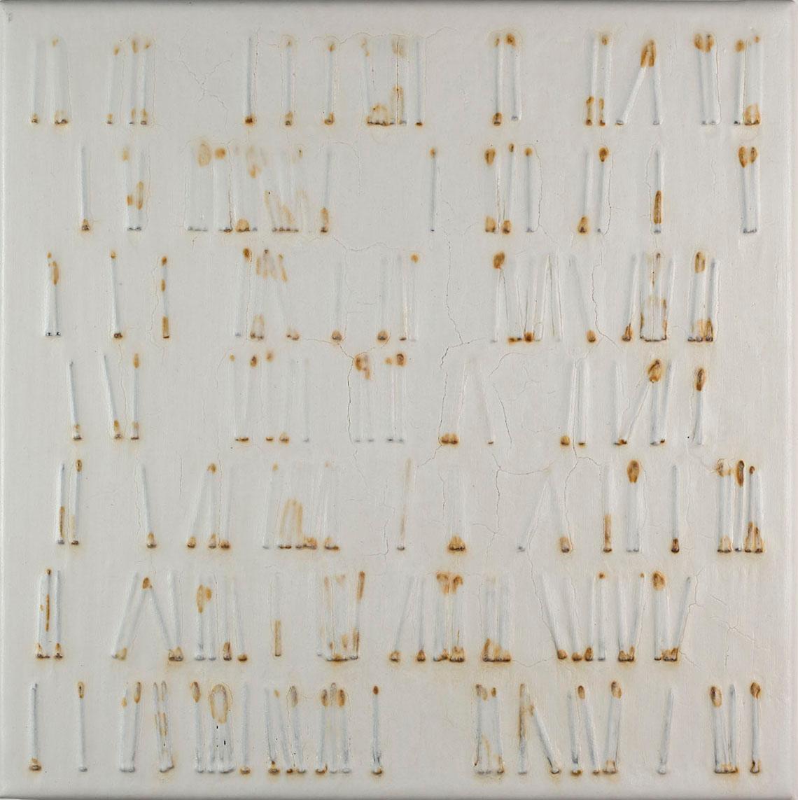 Nail forms in seven rows, each individual form tilted and spaced uniquely