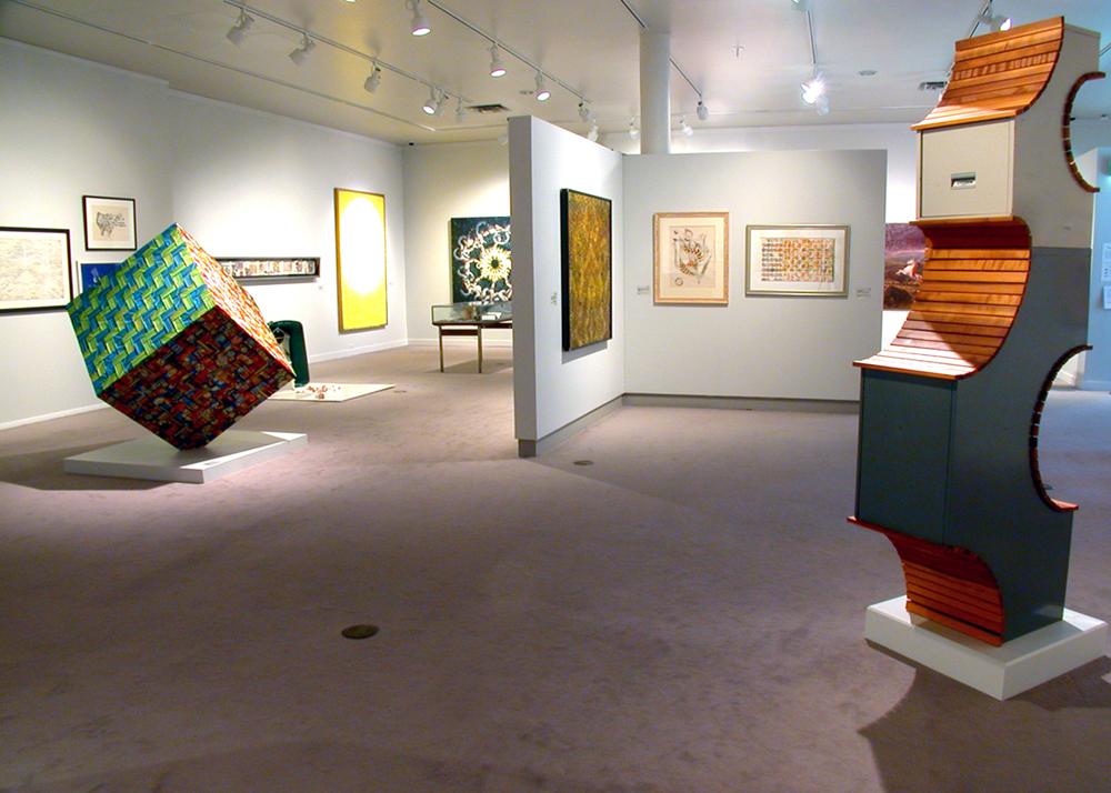 A view of the exhibition with the file cabinet and cube sculptures