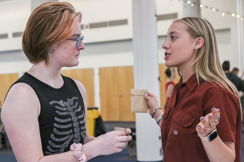 Two students talking.