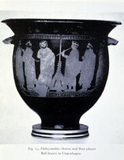 Greek vase depicting a dithyrambic chorus and flute-player (click to see larger image)