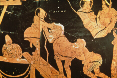 Greek vase depicting a slave pushing an old man up a ramp in a comedy (click to see larger image)
