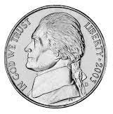 A U.S. nickel coin on heads.