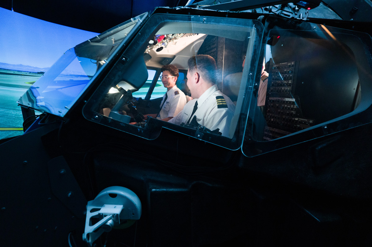 Students in Cockpit Simulator