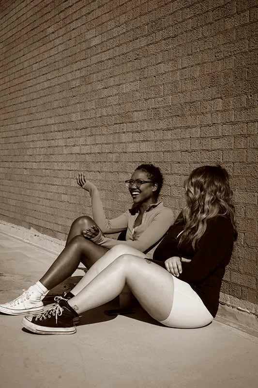 Friends chatting on campus