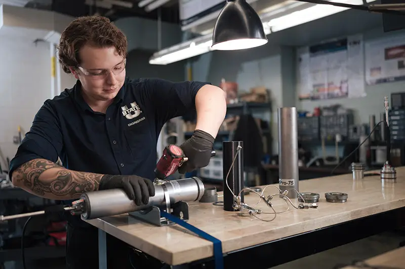 Engineering student working on a project