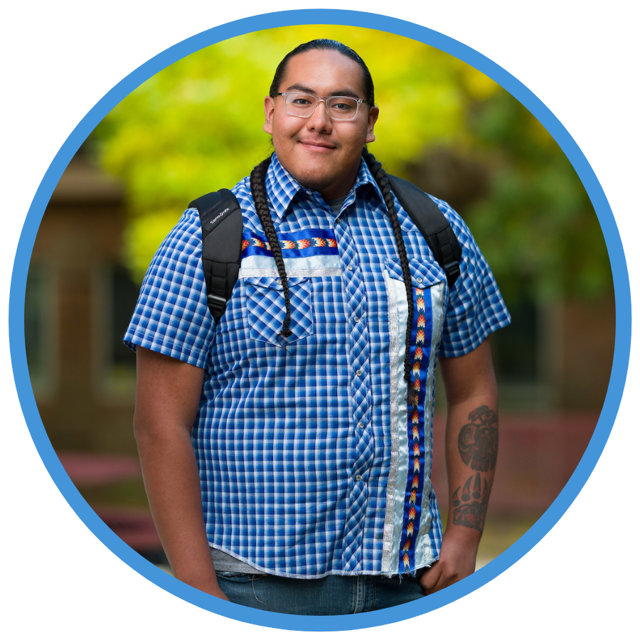 USU Uintah Basin student standing and smiling at the camera.