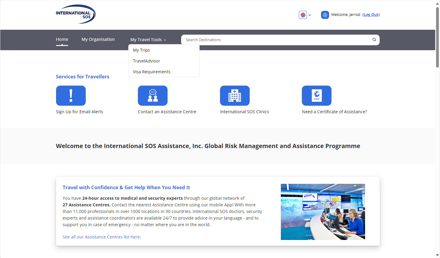 A screenshot of the International SOS portal homepage, with the My Travel Tools top navigation dropdown expanded showing three options: My Trips, TravelAdvisor, and Visa Requirements