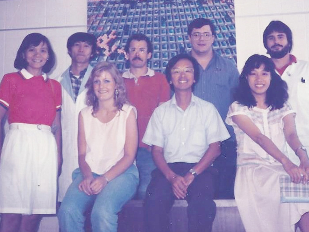 Robinson is seated at left, with undergraduate research mentor, Professor Joseph K-K.