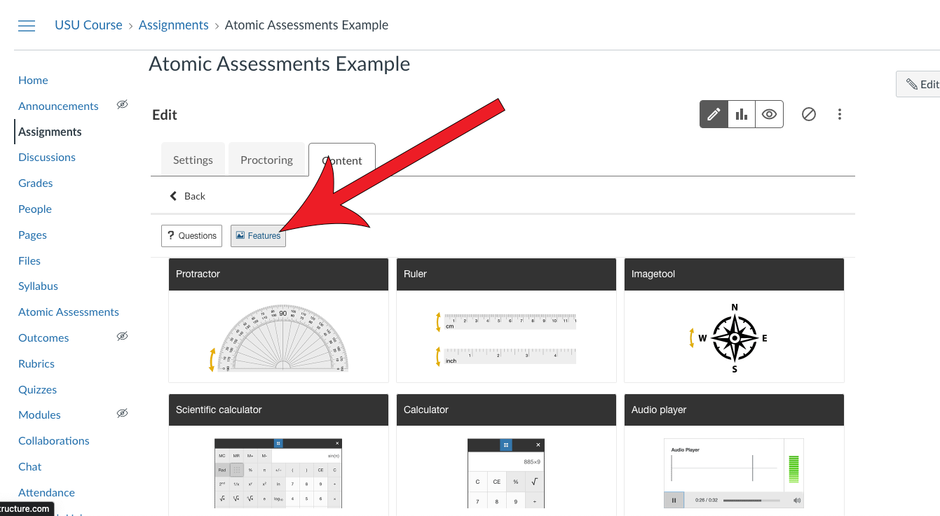 Arrow pointing at Features button in Item Options in Atomic Assessments.