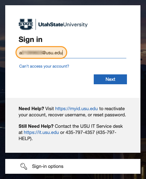 Zoom login window with an email address A number@usu.edu highlighted in orange. 
