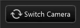 black button showing the words switch camera