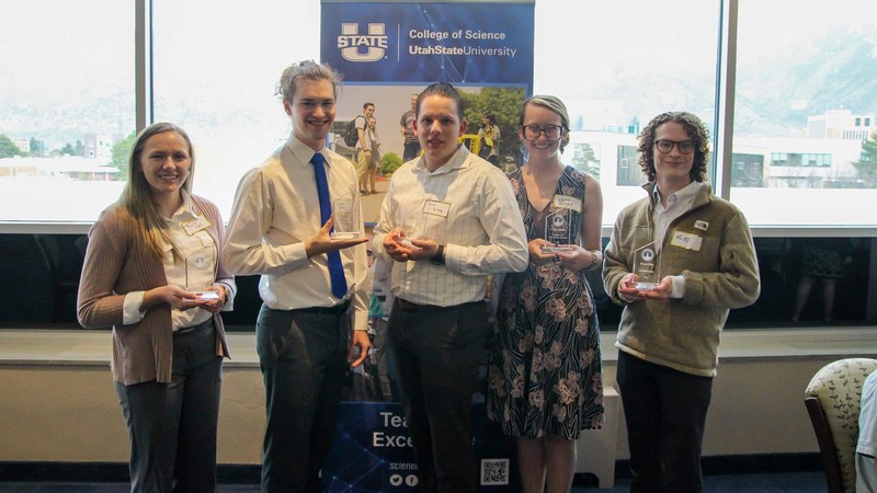 College of Science scholars pose with awards.