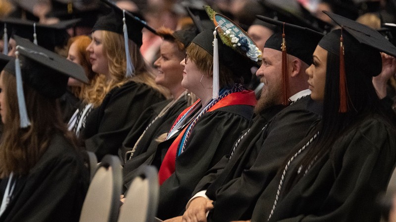 Graduates listen during the 2022 USU Uintah Basin Commencement.