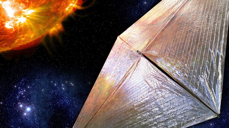 A computer rendering shows a spacecraft with an unfolded square membrane acting as a solar sail.
