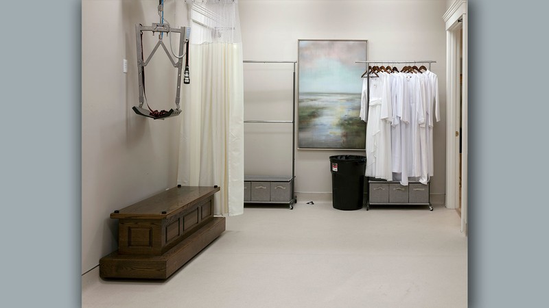 A white room in a funeral home.