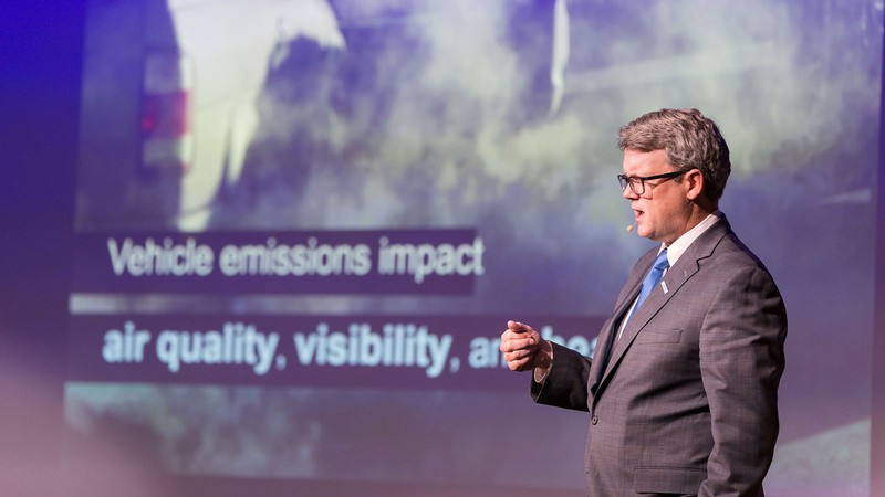 A person speaking at a conference.