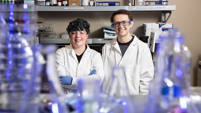 Emilee Rickabaugh and Dillon Weatherston in a lab.