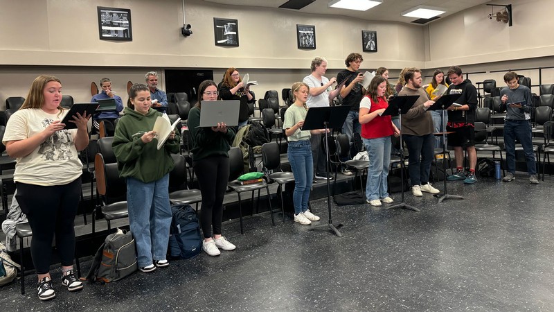 Students rehearsing a musical.