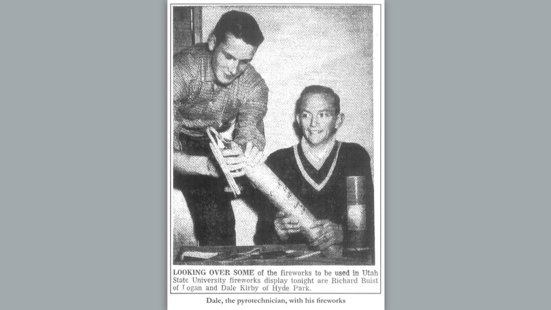 A historical newspaper image. Text reads: Richard Buist and Dale Kirby look over some fireworks.