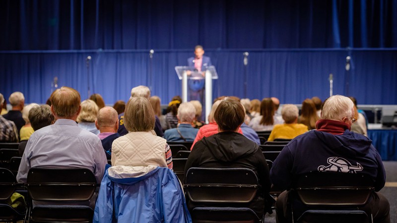 An audience listening to a speech.