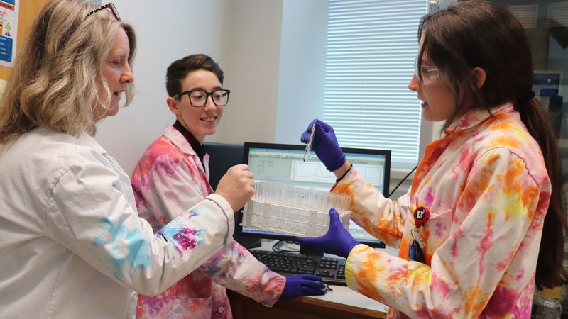 Biochemists in lab.