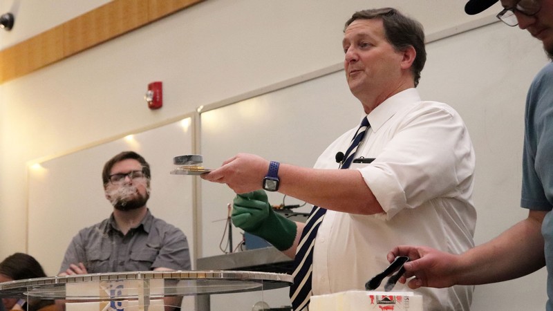 USU physicist James Coburn demonstrates physics.