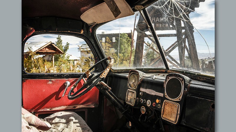 The interior of an antique truck.