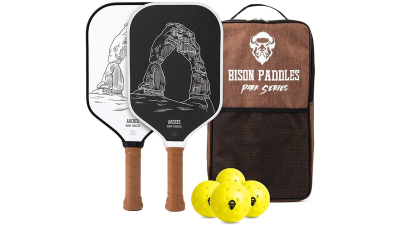 A set of pickleball paddles with a graphic of Delicate Arch.