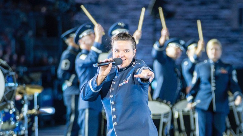 Nicole Vander Does singing with a marching band.