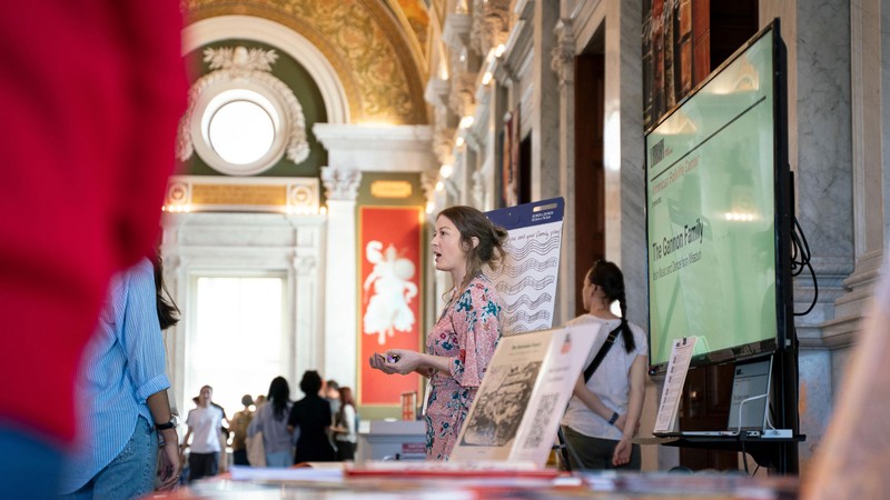 Andrea Decker at an informational exhibit.