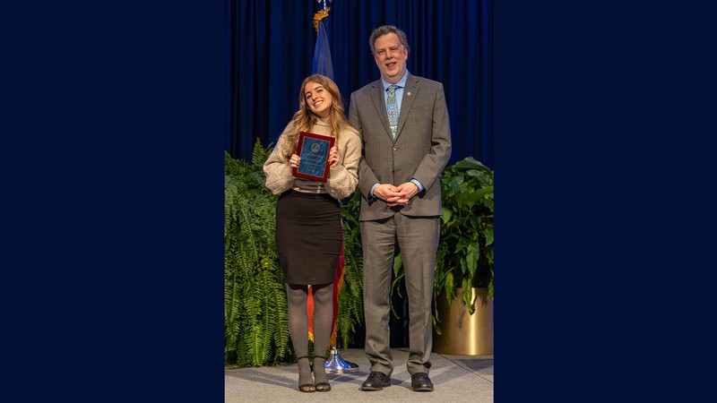 Kyla Dahle receiving an award.
