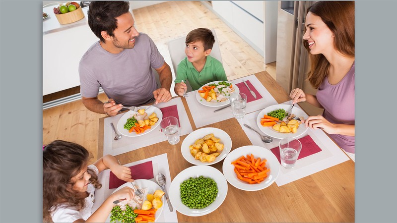 A family eating at a table.
