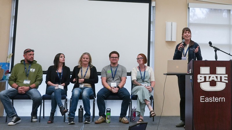 People speaking at an event.