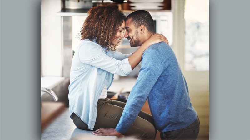 Two people embracing.