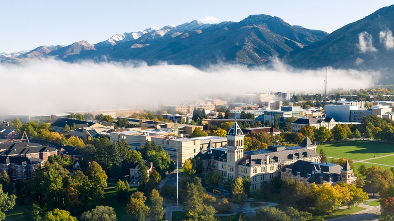 A fog cloud drifting over the USU Logan campus.