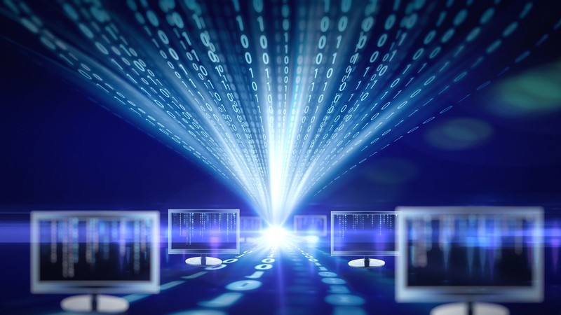 A graphic of computers an ones and zeroes beaming through the air.