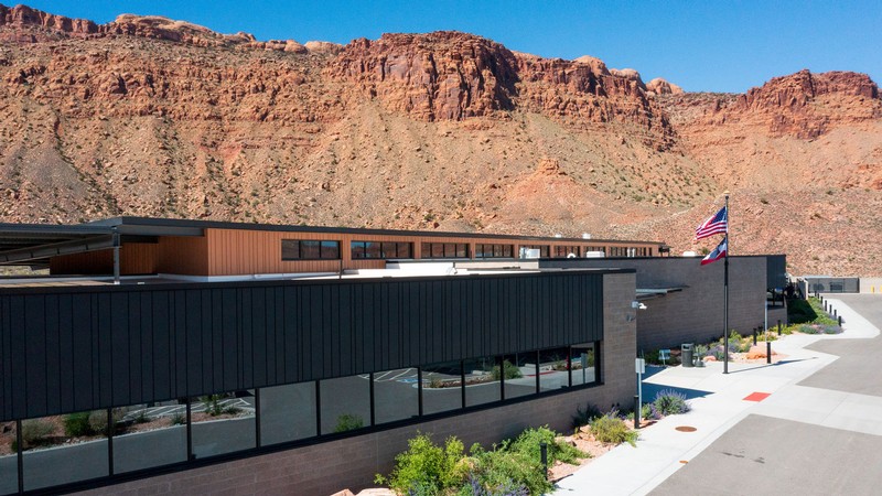 The USU Moab campus with redrock cliffs in the background.
