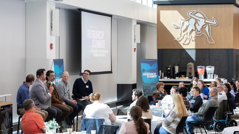 A panel presentation at a conference.