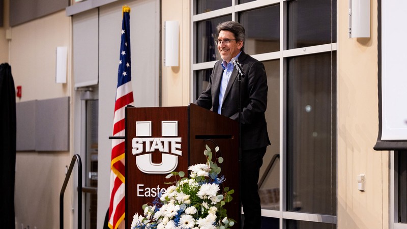 Al Smith speaking at an event.