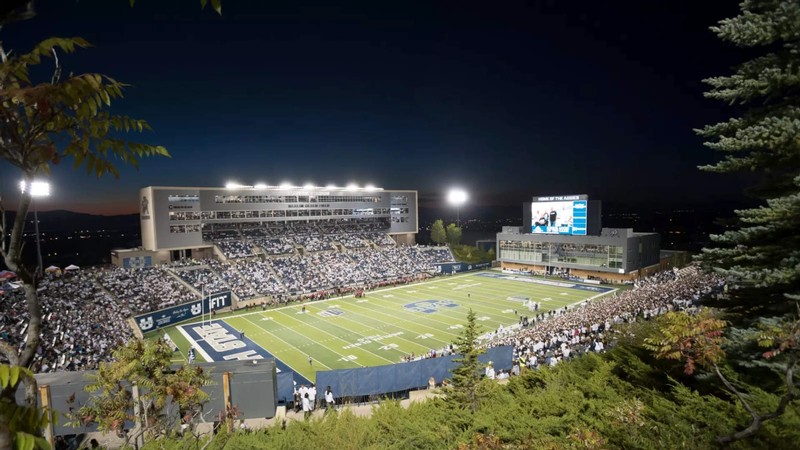 USU's Maverik Stadium during a football game at night.