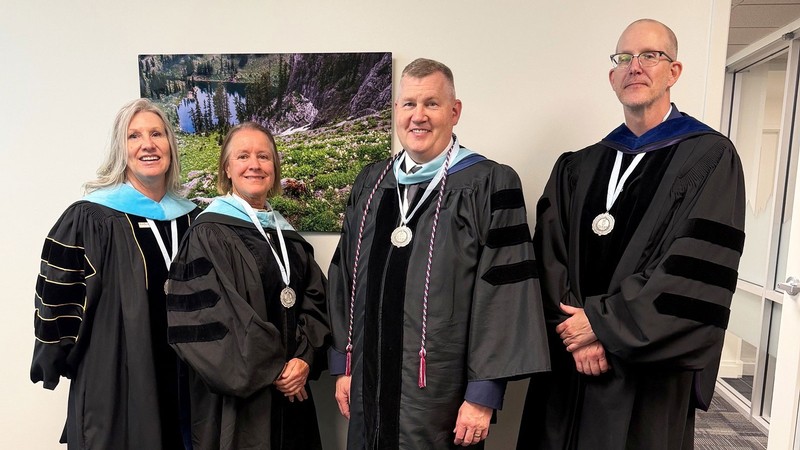 Faculty members in academic gowns.