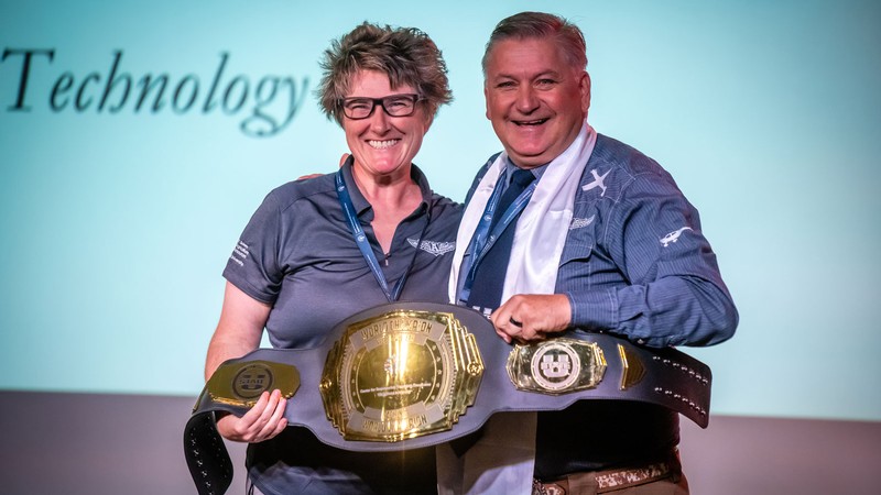 Shalyn Drake and Baron Wesemann at an award ceremony.